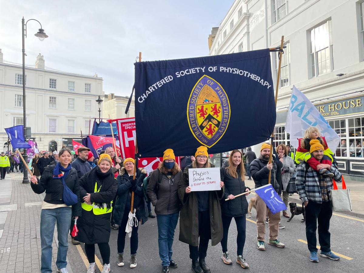 The CSP banner among a large trade union march